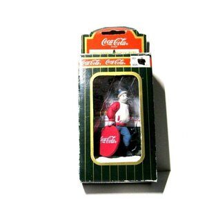 Coca Cola Ornament Man carrying Round Coca Cola